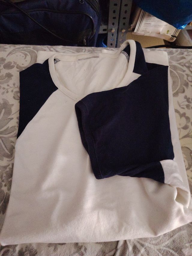 Camiseta Nike manga ranglan blanca y negra