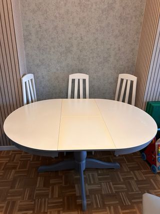 Mesa redonda extensible gris y blanca