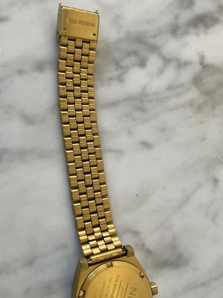 Reloj Nixon Dorado y Blanco