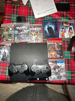 PS3 Slim con 2 mandos y 8 juegos