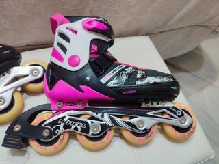 Patines en línea rosas y negros