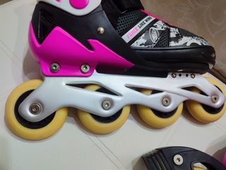 Patines en línea rosas y negros