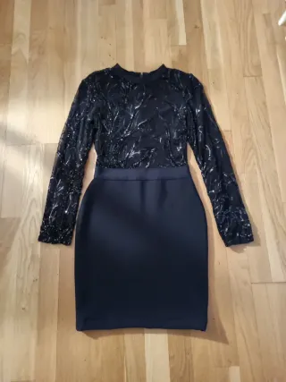 Vestido fiesta lentejuelas ajustado.