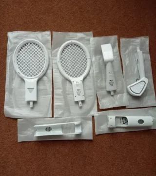 Wii NUEVO. 2 Raquetas+2 Palos Golf 'Con luz'