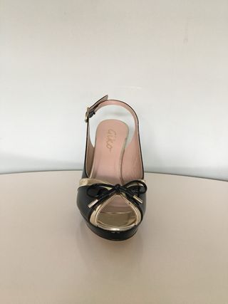 Salón abierto Giko negro/dorado