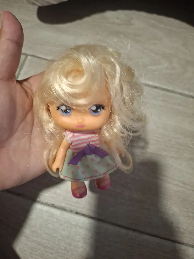 Muñeca Barriguitas rubia vestido rosa y verde