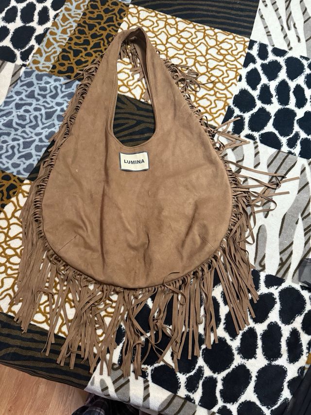 Bolso saco flecos LUMINA