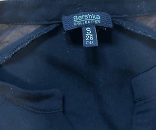 Mono corto negro,talla S
zona hombros transparente