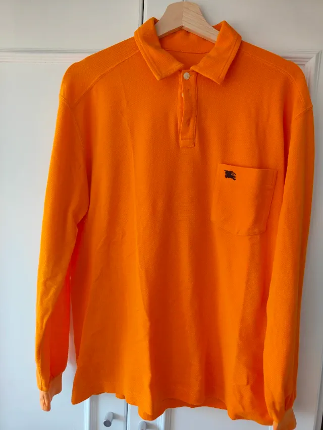 Polo Burberry manga larga naranja