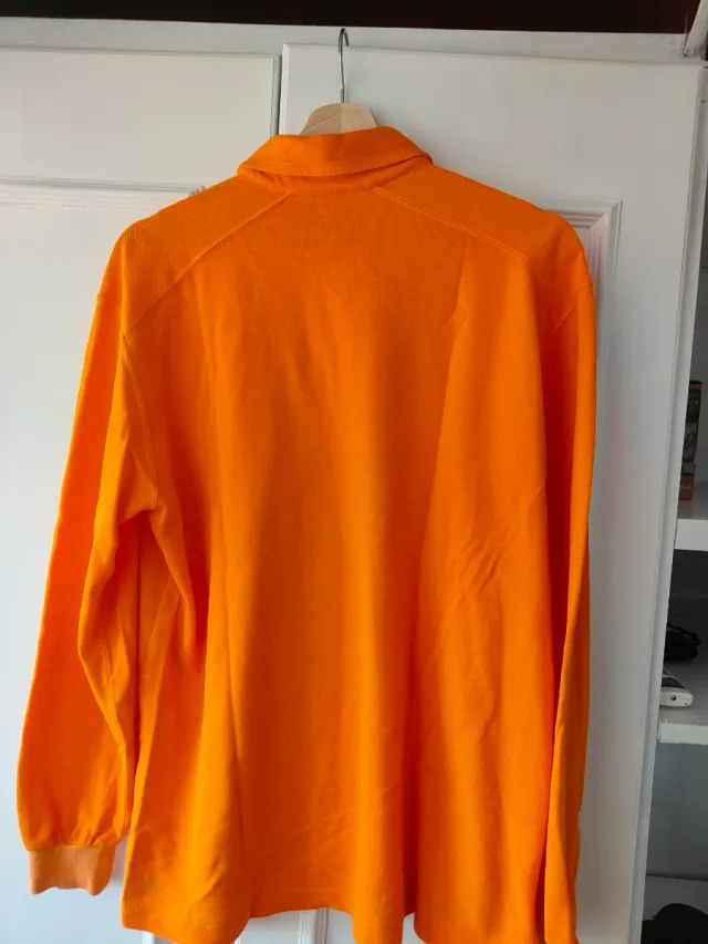 Polo Burberry manga larga naranja