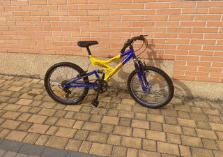 Bicicleta infantil azul y amarilla 20”