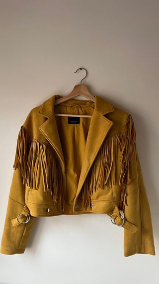 Chaqueta ante flecos amarilla