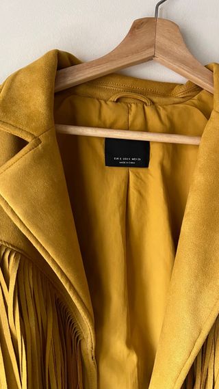 Chaqueta ante flecos amarilla