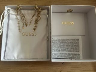 Pendientes Guess dorados con estrellas