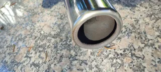 Cola de escape cromada