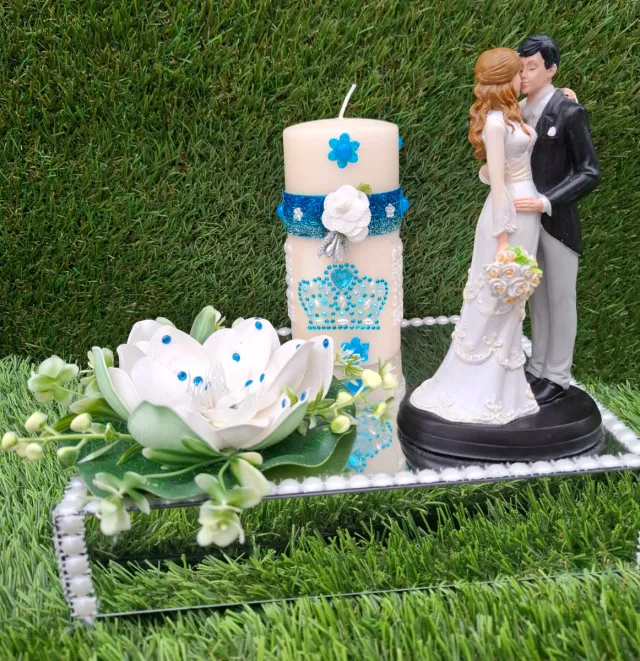 Centro de mesa boda vela flor y pareja