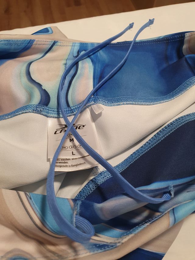 Conjunto deportivo mujer azul y multicolor