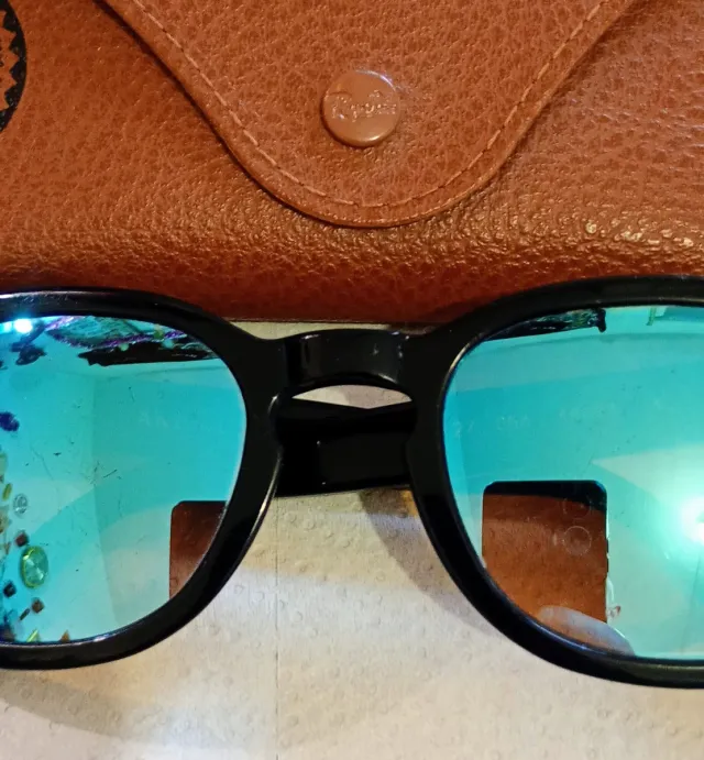 Occhiali da sole Ray-Ban neri lenti azzurre