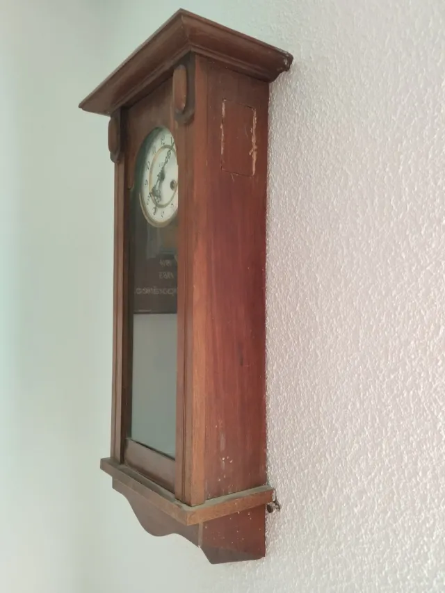 Reloj de pared C. Coppel con péndulo