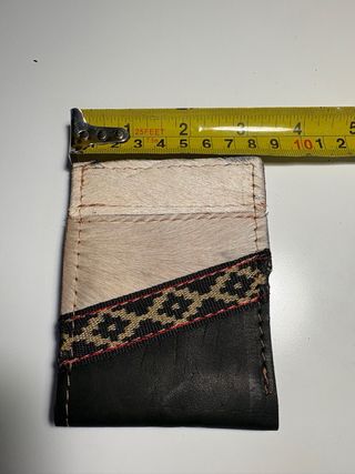 Portafoglio in cuoio e pelle