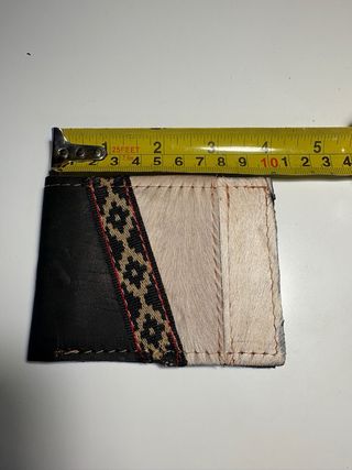 Portafoglio in cuoio e pelle