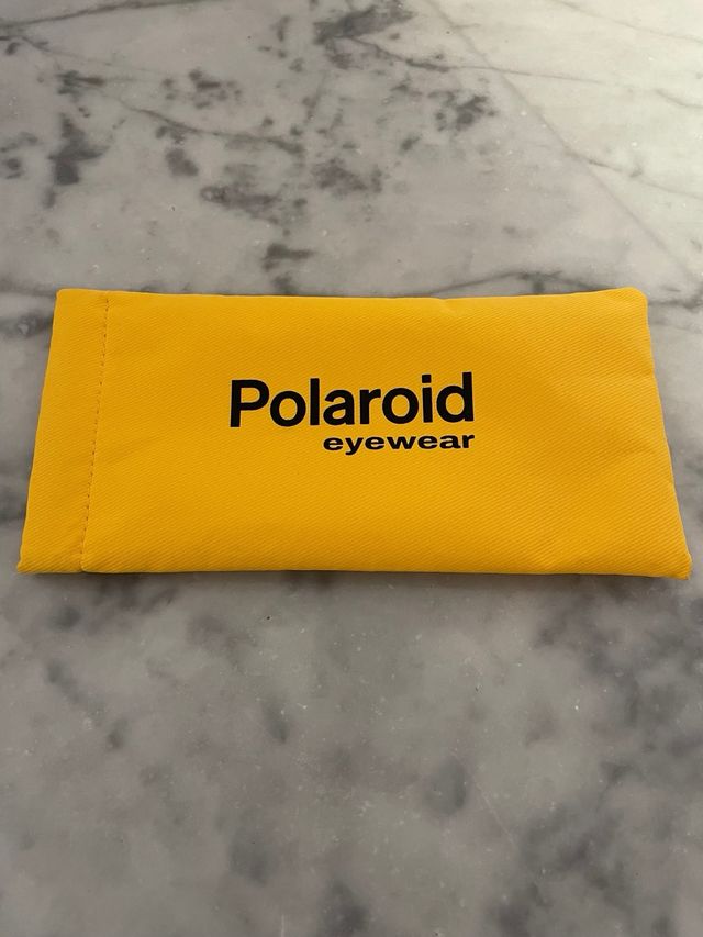 Gafas de sol Polaroid doradas y verdes