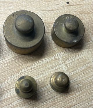 Set 8 vecchi pesi in ottone