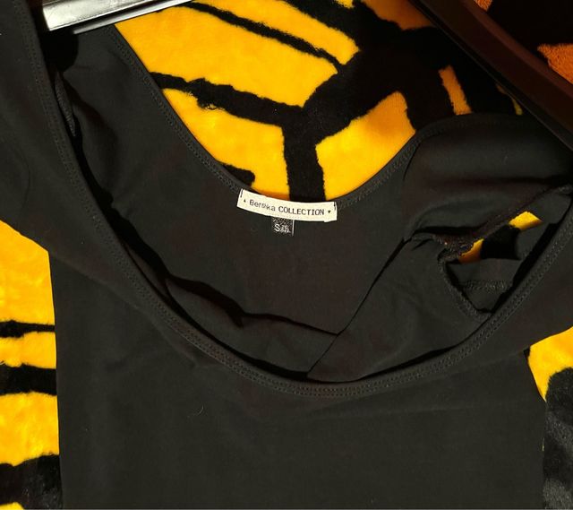 Vestido negro peplum