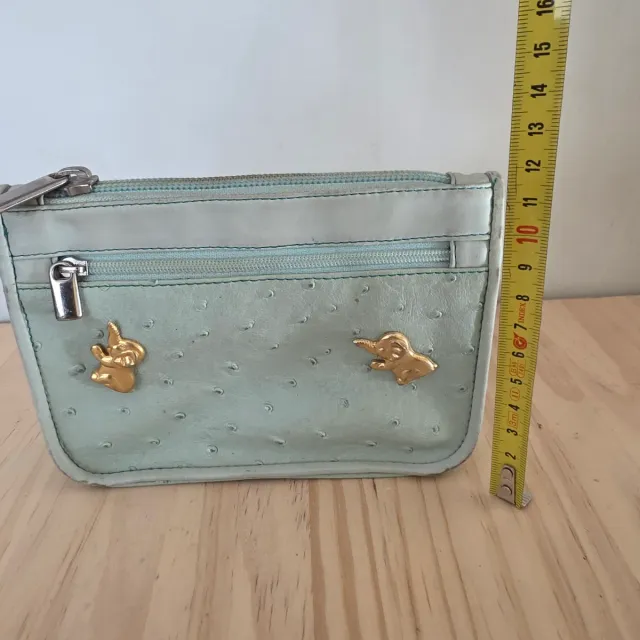 REGALO Neceser pequeño con elefantes dorados