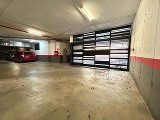 Plaza de garaje amplia + moto