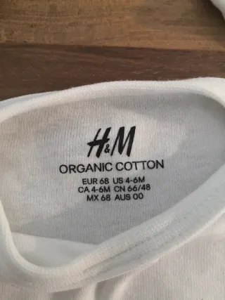 Lote de bebé: ropa, body, pijama y cambiador portá