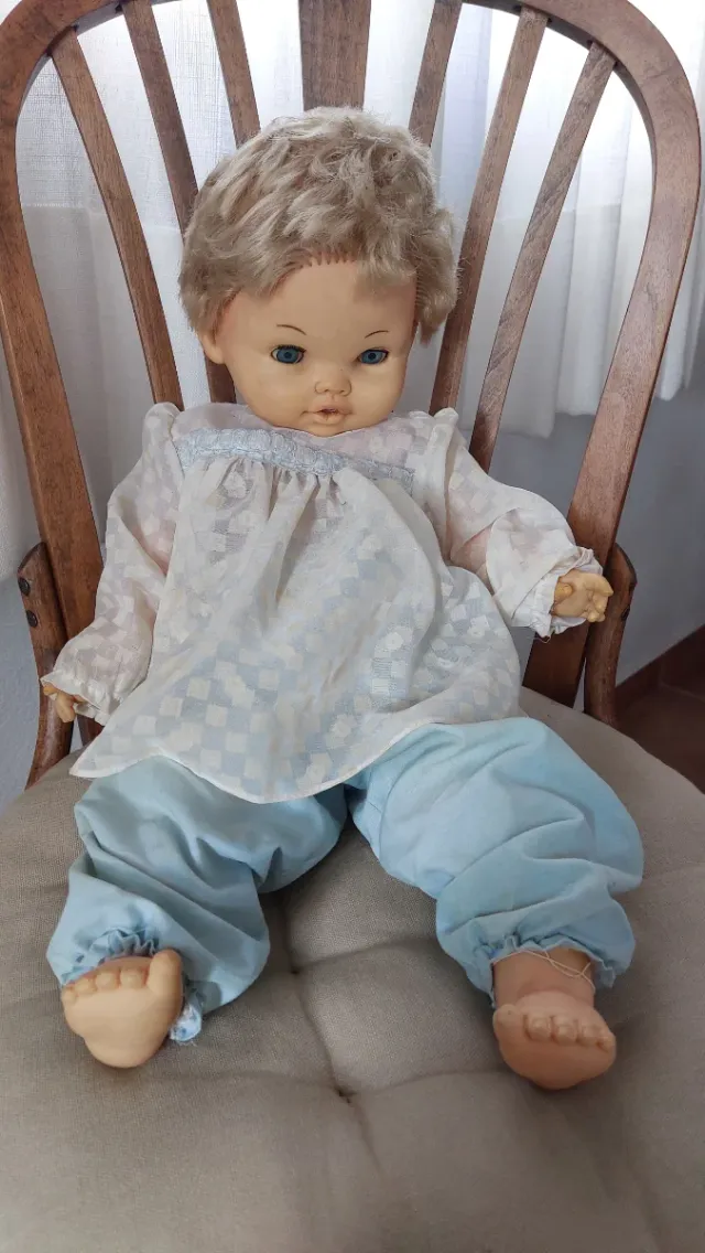 Muñeca antigua rubia ojos azules