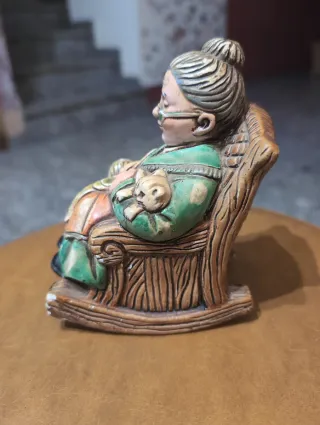 Figuras porcelana abuelos con mascotas