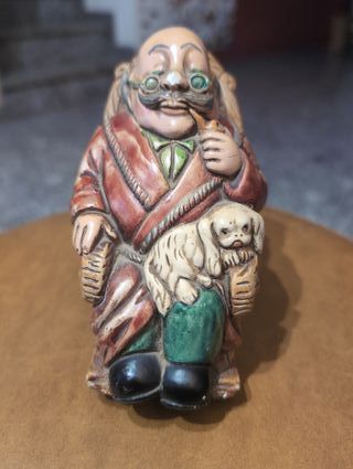 Figuras porcelana abuelos con mascotas