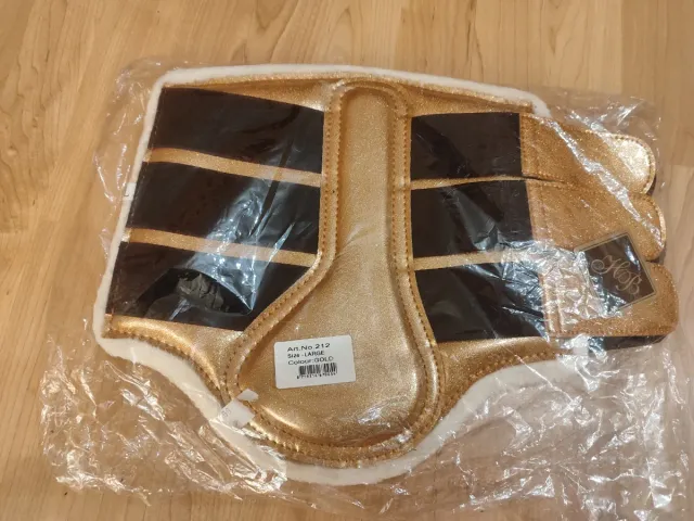 Protectores caballo purpurina dorada