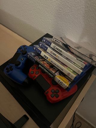 Consola PS4 + 5 Juegos FIFA y GTA