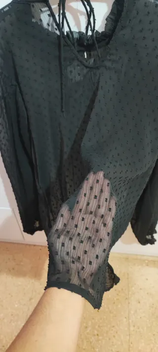 Blusa transparente negra