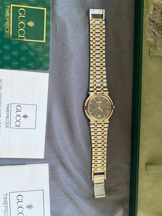 Orologio Gucci 9000M placcato in oro e acciaio