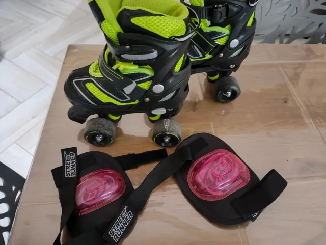 Pattini a rotelle per bambino neri e gialli