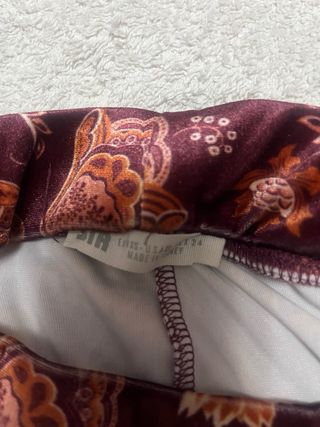 Collant rosa melanzana con stampa floreale