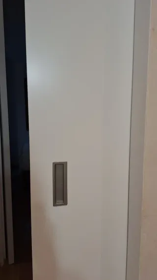 Puerta corredera herrajes ocultos