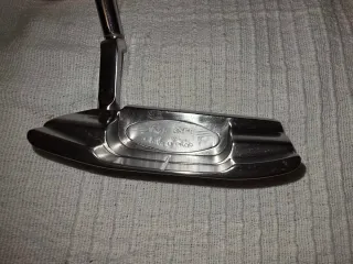 Palo de golf con funda