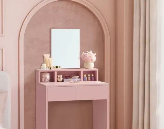 Tocador rosa con espejo y cajones