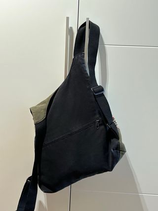 Mochila tela con bolsillo trasero