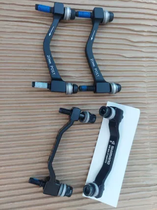 ADAPTADORES 180MM MONTAJE PINZAS DE FRENO BICI.