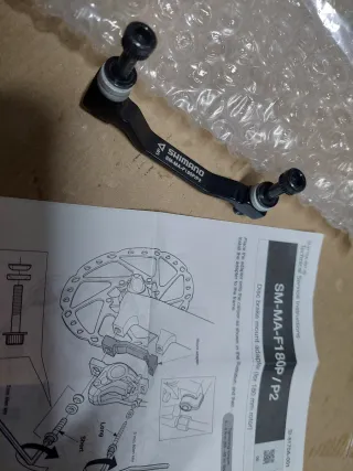 ADAPTADORES 180MM MONTAJE PINZAS DE FRENO BICI.