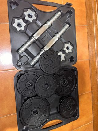 Pesas de gimnasio con maletín