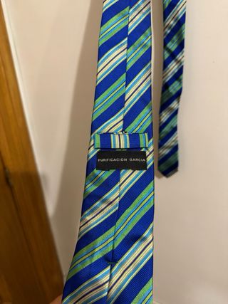Corbata Purificación García Rayas