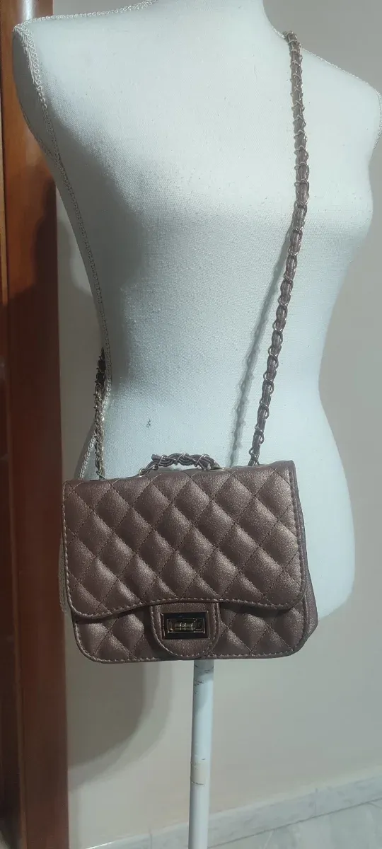 Borsa rosa dorata trapuntata