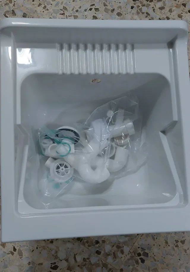 Lavadero blanco con patas